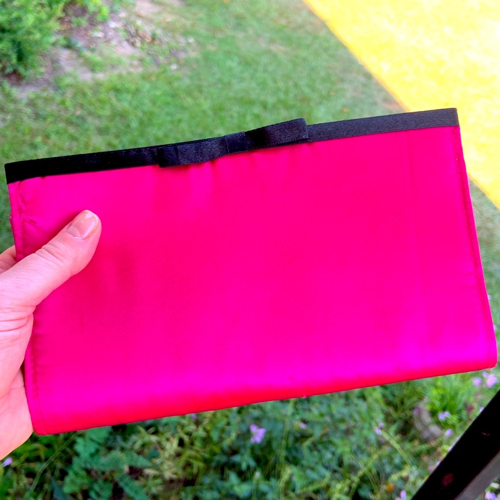 Fuschia clutch with bow